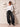 Maglia oversize con spalline bianca con jeans baggy – Continued Shop