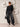 Maglia oversize con spalline nera con jeans baggy – Continued Shop